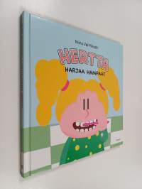 Hertta harjaa hampaat