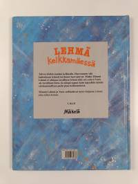 Lehmä kelkkamäessä