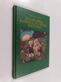 Kolme pikku karhua suuressa metsässä
