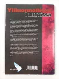 Yliluonnollisen lumoissa : matkani henkien ja okkultismin maailmaan