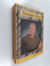 Tusinan äitee