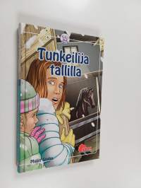 Tunkeilija tallilla