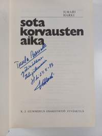Sotakorvausten aika (signeerattu, tekijän omiste)