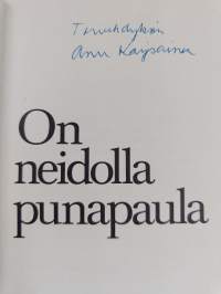 On neidolla punapaula (signeerattu, tekijän omiste)