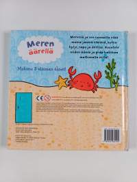 Meren äärellä
