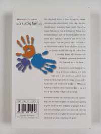 En riktig familj (signeerattu)