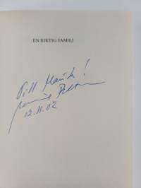 En riktig familj (signeerattu)