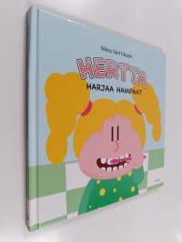 Hertta harjaa hampaat