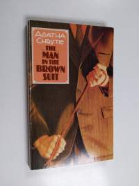The man in the brown suit