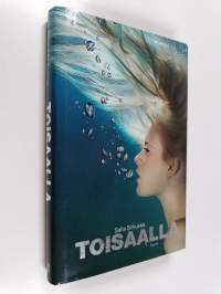 Toisaalla