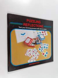 Puzzling Reflections : Two Sets of Intriguing Mirror-cube Puzzles to Make and Solve