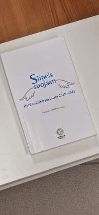Siipeis suojaan