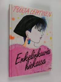 Enkelinkuvia hiekassa