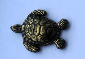 Kilpikonna pöytäkoriste pronssia 5x3 cm    - koru