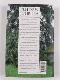 Puiden juurilla : puut ja pensaat luonnossa ja kansanperinteessä