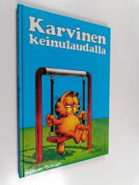 Karvinen keinulaudalla