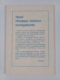 Nepal savenvalajan pyörällä