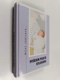 Pitäisin pientä sylissäni