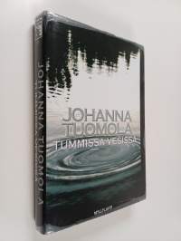 Tummissa vesissä : jännitysromaani