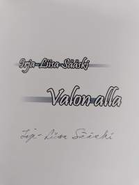 Valon alla (signeerattu)