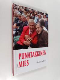 Punatakkinen mies