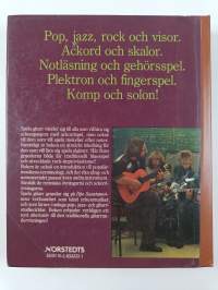 Spela gitarr!