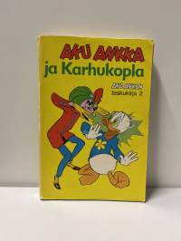 Ensipainoksia myyntiin.Aku Ankka ja Karhukopla 2.