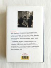 Kuvassa keskellä Jukka Virtanen