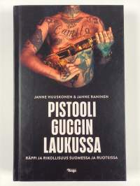 Pistooli Guccin laukussa