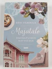 Majatalo omenapuiden katveessa
