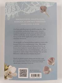 Majatalo omenapuiden katveessa