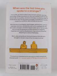 The power of strangers : the benefits of connecting in a suspicious world