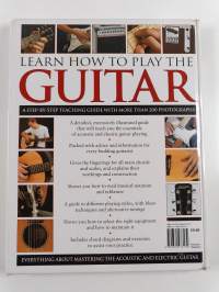 Learn how to play the guitar : a step-by-step teaching guide with more than 200 photographs