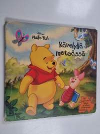 Kävelyllä metsässä