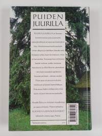 Puiden juurilla : puut ja pensaat luonnossa ja kansanperinteessä