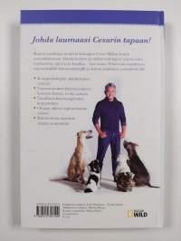 Koirakuiskaajan parhaat neuvot : opas onnelliseen koiranelämään