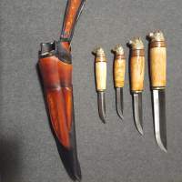 Puukko; neljänevoinen  karhunpää puukko