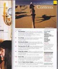 National Geographic  - December 2002. The Magic of Snowy Owls. By Camel Across The Sahara