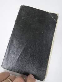 Lauluja - 1928, perinteinen musta vahakantinen vihko, johon kirjoitettu laulujen sanoja