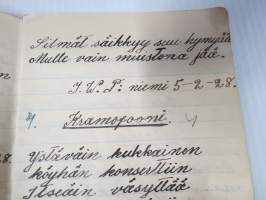 Lauluja - 1928, perinteinen musta vahakantinen vihko, johon kirjoitettu laulujen sanoja