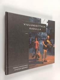 Viulunsoittaja kadulla : es muss sein