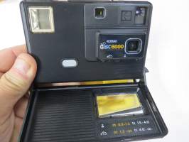 Kodak Disc 6000 camera -kamera alkuperäisessä pakkauksessaan, mukana ranneke ja ohjekirja +erillinen suomenkielinen ohjekirja