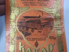 Kaakaojauhetta - Kakaopulver - A.M. Merikanto, Tampere - Tammerfors -pussi / tuotepakkaus