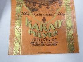 Kaakaojauhetta - Kakaopulver - A.M. Merikanto, Tampere - Tammerfors -pussi / tuotepakkaus