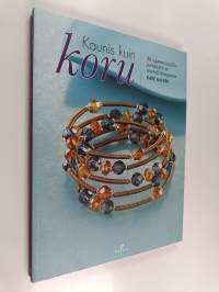 Kaunis kuin koru : 30 upeaa mallia helmistä ja metallilangasta