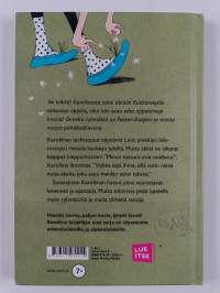 Karoliina ja noidutut tossut