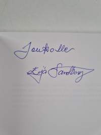 Tumman verhon takana (signeerattu, tekijän omiste)