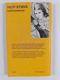 Neiti Etsivä kummitustalossa