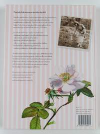 Isoäidin puutarhavuosi : neuvoja joka kuukaudelle