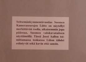 Aatamin kuvia ja vähän Eevankin -  Suomen Kameraseurojen Liitto 1932-2002.  ( Järjestöhistoriikki, kuvateos, valokuvat, visuaalinen kulttuuri )